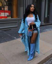 Sky-blue oversized shawl coat with geometric knit pattern, open front