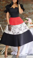 Tiered midi dress with scalloped puff sleeves, black bodice and red/white tiered skirt