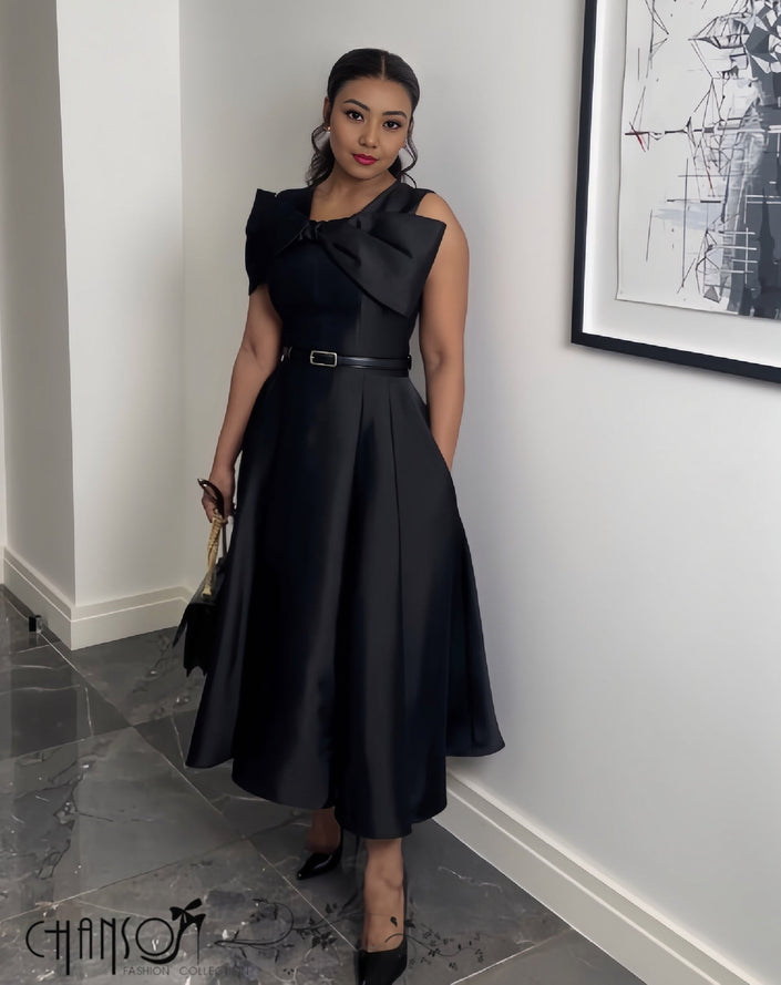 Black bow-neck midi fit-and-flare evening dress with large shoulder bow and belt