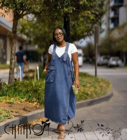 Dark blue denim maxi dress with adjustable straps, wrap tie front and patch pockets