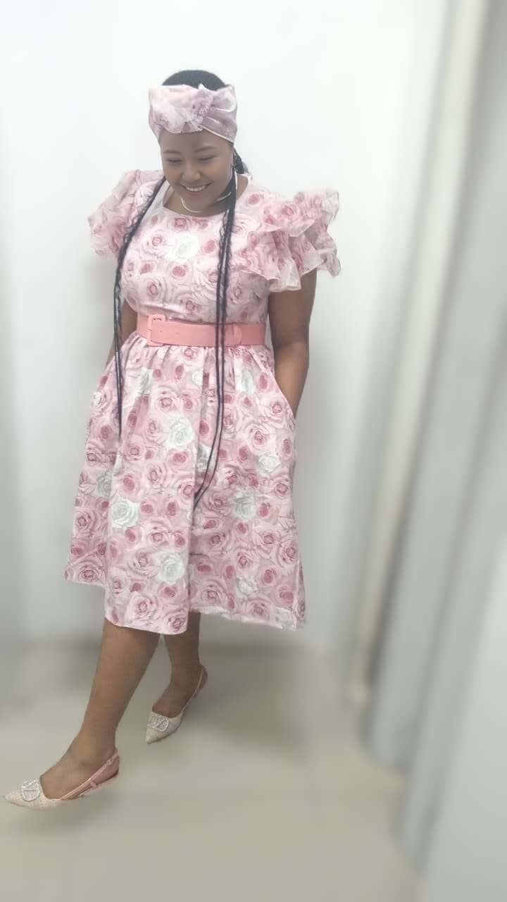 Women's Puff Sleeve Dress featuring Rose Patterns and Belted Design