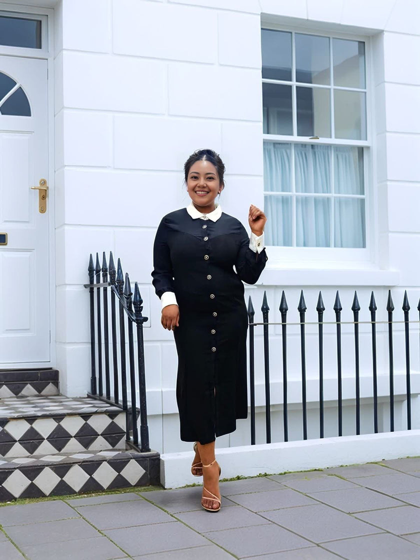Vintage black midi dress with white contrast collar and row of front buttons