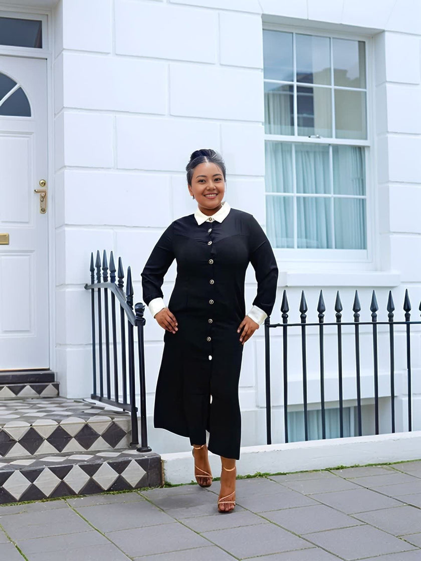 Black midi shirt dress style with contrast white collar and long sleeves