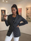 Double-breasted blazer with lapel and front pocket accents