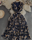 Navy-blue floral midi dress with tied waist and tiered skirt