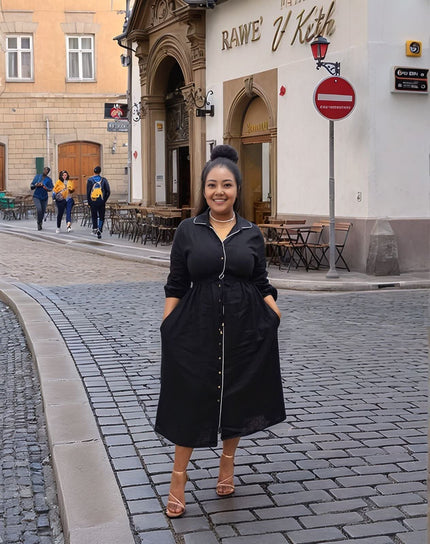 Black midi button-front dress with tie waist, long sleeves and V-neck