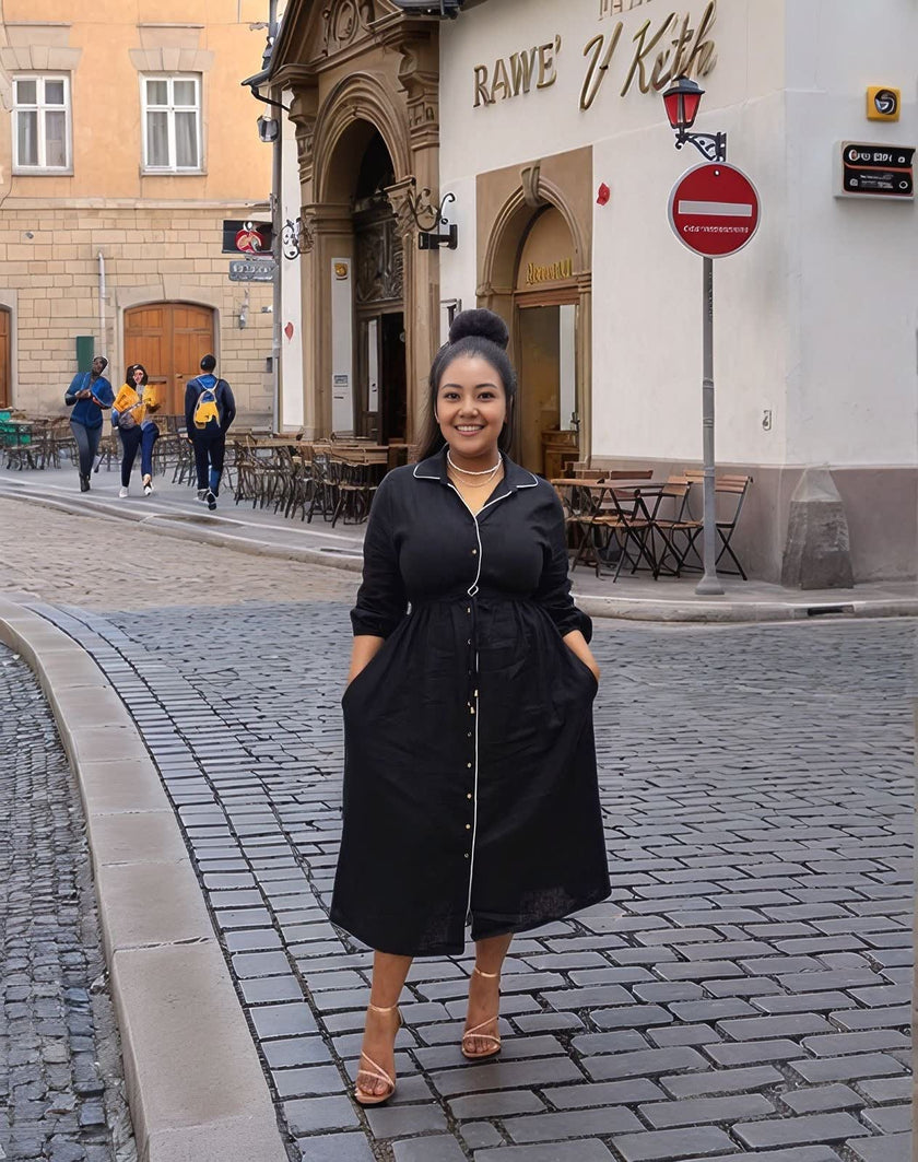 Black midi button-front dress with tie waist, long sleeves and V-neck