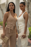 Nude cargo pants and sleeveless utility vest set with flap pockets and adjustable fit