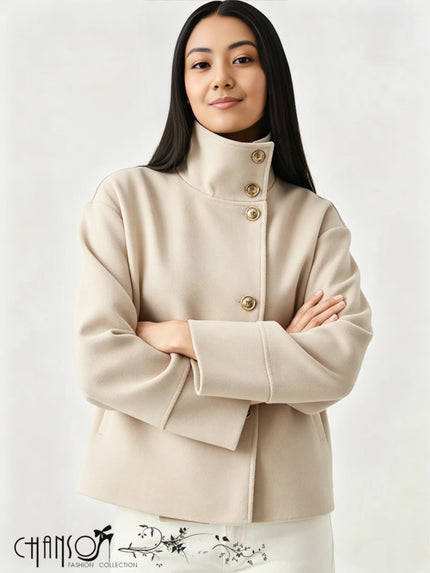Beige double-breasted high-neck city coat with gold button front and long sleeves