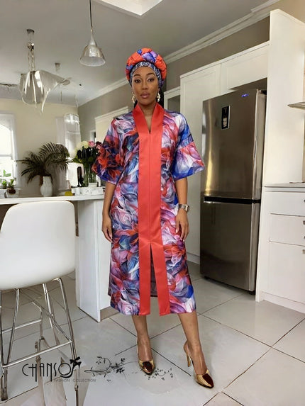 Floral maxi dress with V-neck and headband, vivid multicolor floral print with orange trim