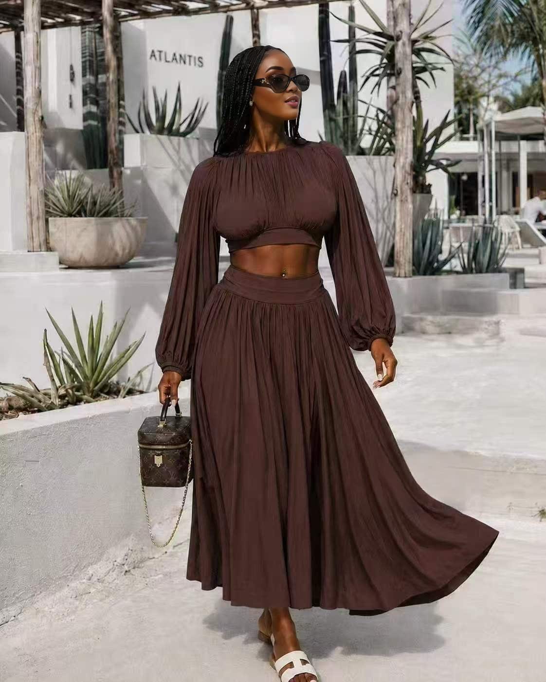 Flowing skirt dress set in dark brown, long gathered sleeves and full pleated midi skirt