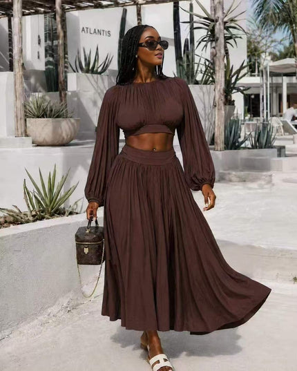 Flowing skirt dress set in dark brown, long gathered sleeves and full pleated midi skirt
