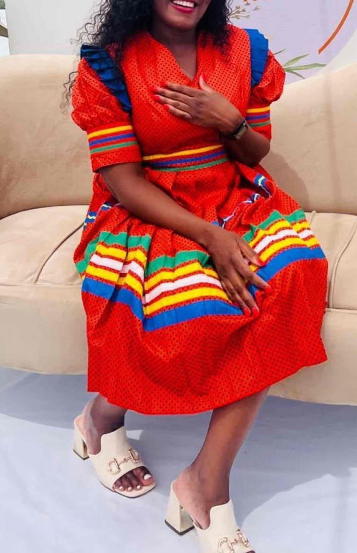 Red puff-sleeve belted midi dress with striped accents and V neckline