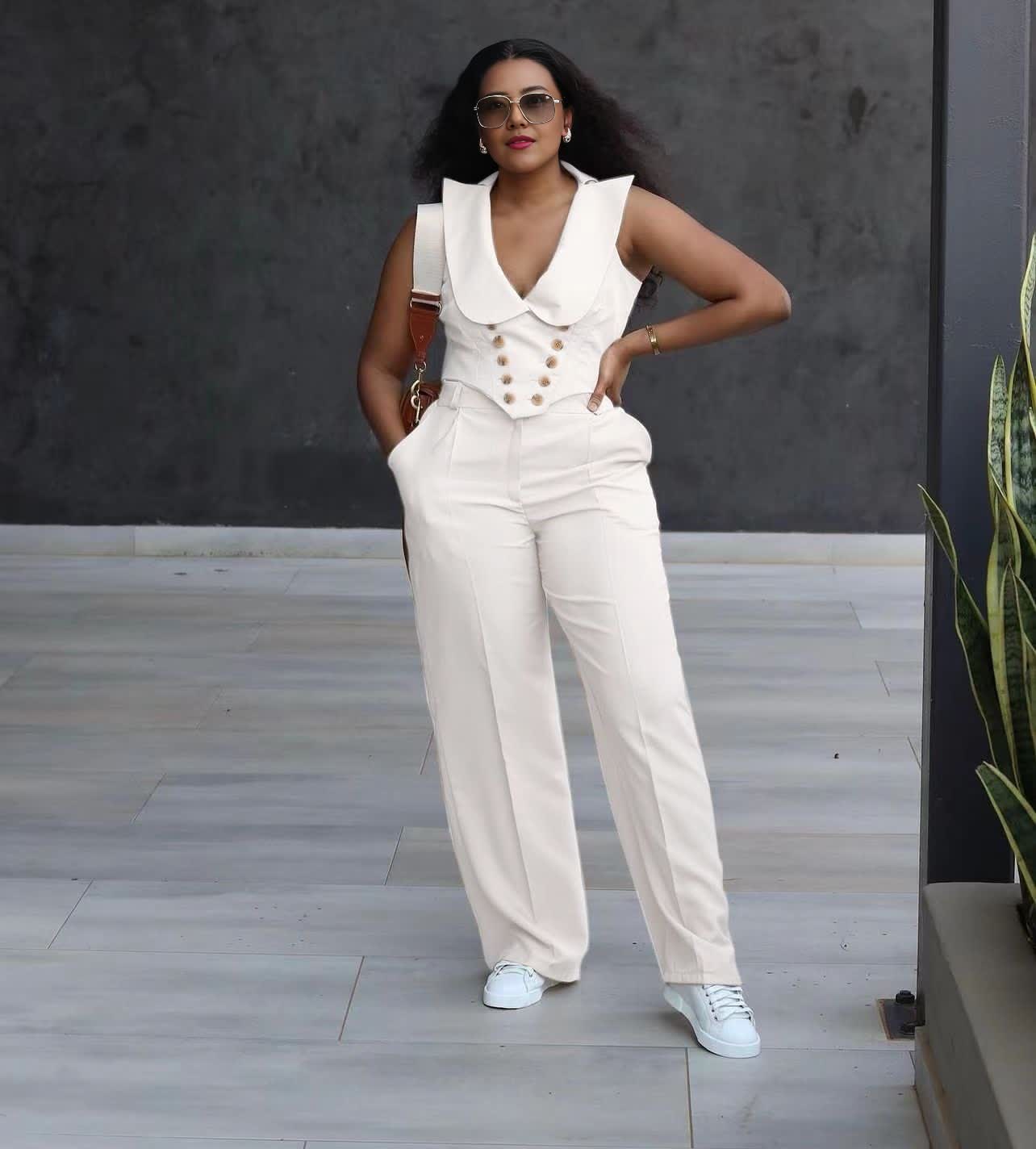 White wide-leg jumpsuit with sleeveless V-neck collar vest and buttoned center