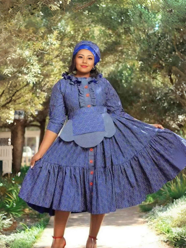 Blue tiered midi dress with button front, ruffle sleeves, and gathered skirt tiers