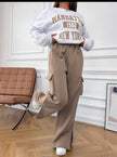 White cropped sweatshirt with 'Manhattan 1982 New York' graphic print on back