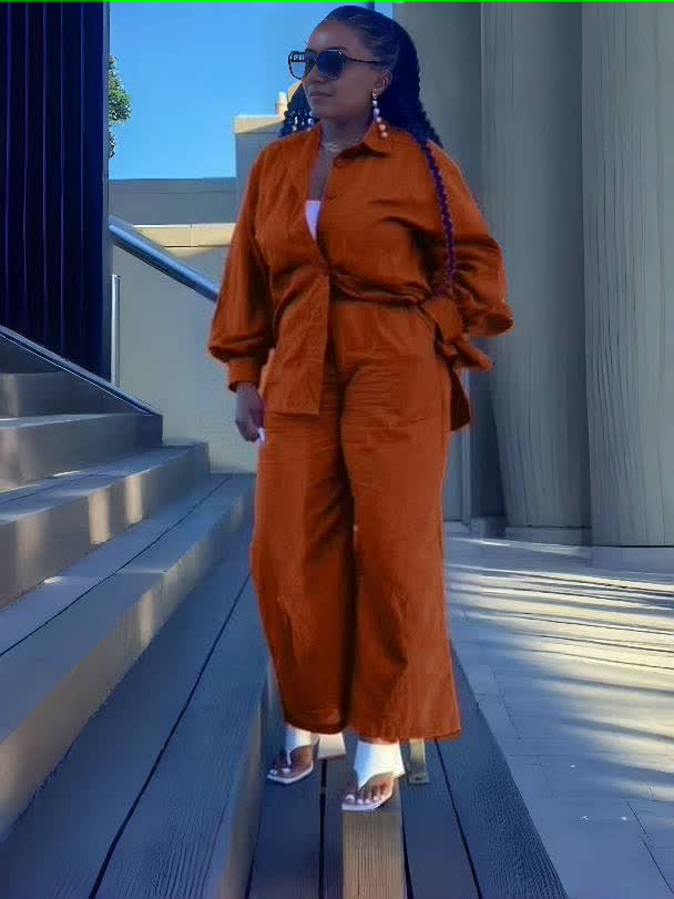 Orange loose shirt and straight pant twin set with button front and tie waist