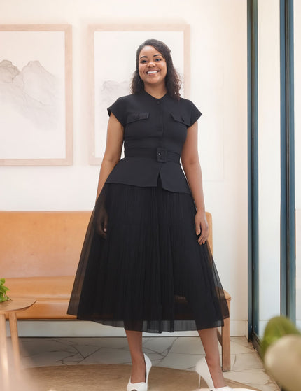 Black pleated skirt twin set with buttoned peplum top and belt detail