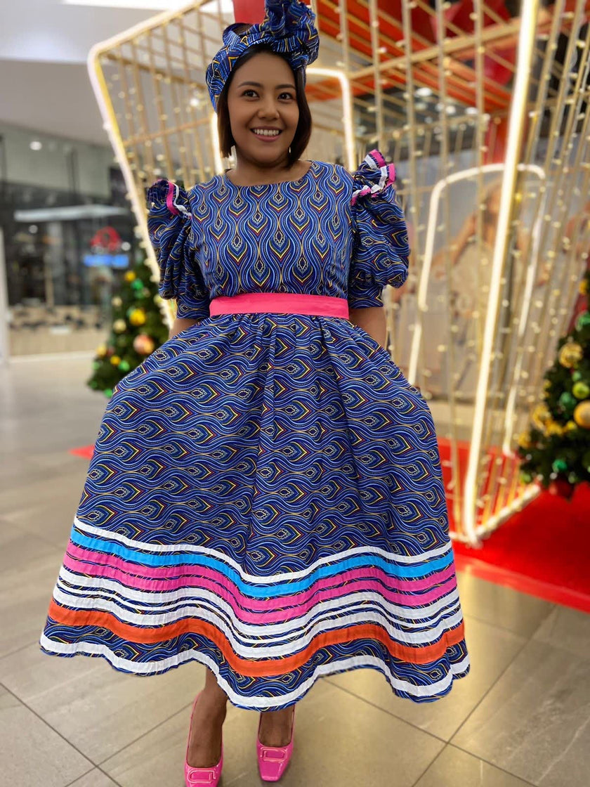 A-Line Dress with Wave-Inspired Print and Striped Hem Detail