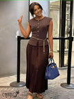 Brown pleated knit midi dress with button detail, peplum waist and belt tassel