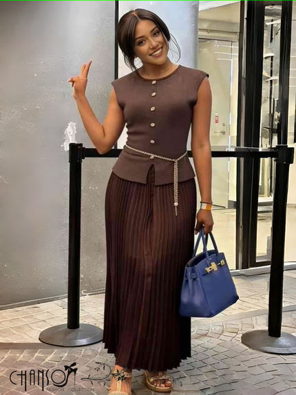 Mauve pleated knit midi dress with button front, belted waist, long pleated skirt