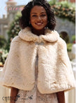 Beige faux fur capelet with rounded collar and decorative brooch closure