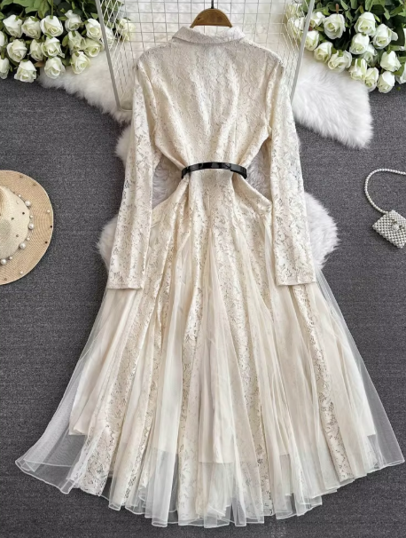 Cream belted lace midi dress with long sleeves and layered flared skirt