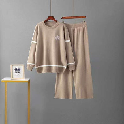 Beige knit twin set: crew sweater and wide-leg pants with light stripe trim