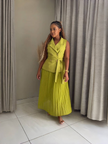 Yellow sleeveless belted blazer with pleated midi skirt, tie waist