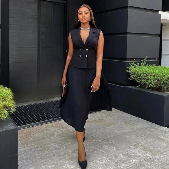 Black sleeveless belted blazer with pleated midi skirt, double buttons