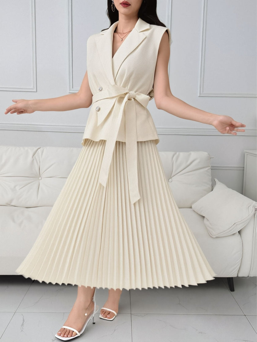 Cream pleated skirt belted blazer set with wrap-style front and sleeveless cut