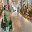 Green embroidered layered skirt with striped hem and gathered tiered look