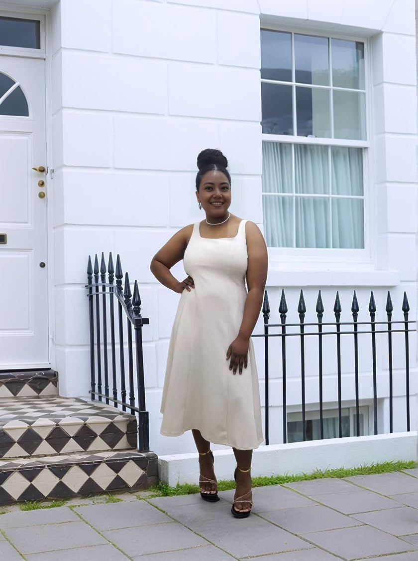 Minimalist Sleeveless Midi Dress with Square Neck and Waist-Defined Silhouette