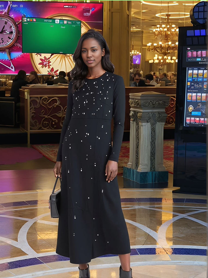 Black star-dot maxi dress with long sleeves and round neckline