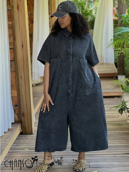 Loose-fit Denim Jumpsuit with large front pockets, short sleeves, button front