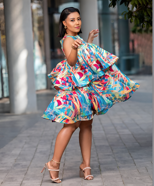 Dress with layered ruffles and  abstract multicolor print
