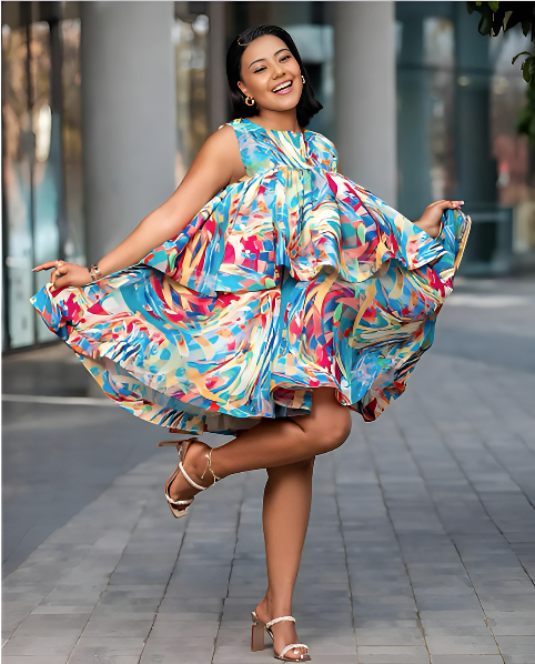 Dress with layered ruffles and  abstract multicolor print