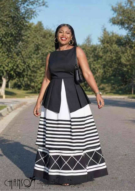 Sleeveless maxi dress in black and white with striped geometric print