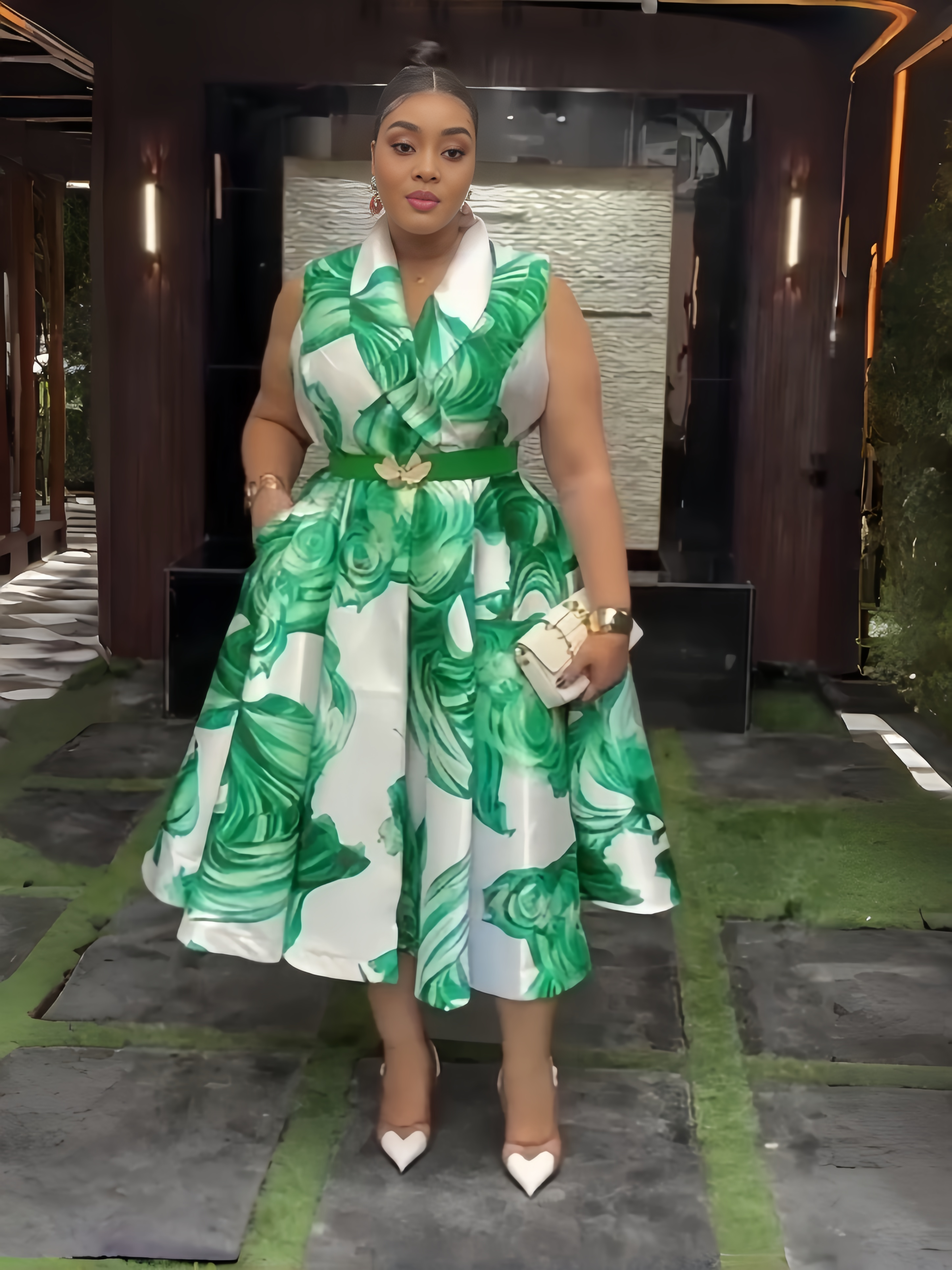 Green floral belted midi dress with white collar, sleeveless bodice