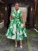 Green floral belted midi dress with white collar, sleeveless bodice