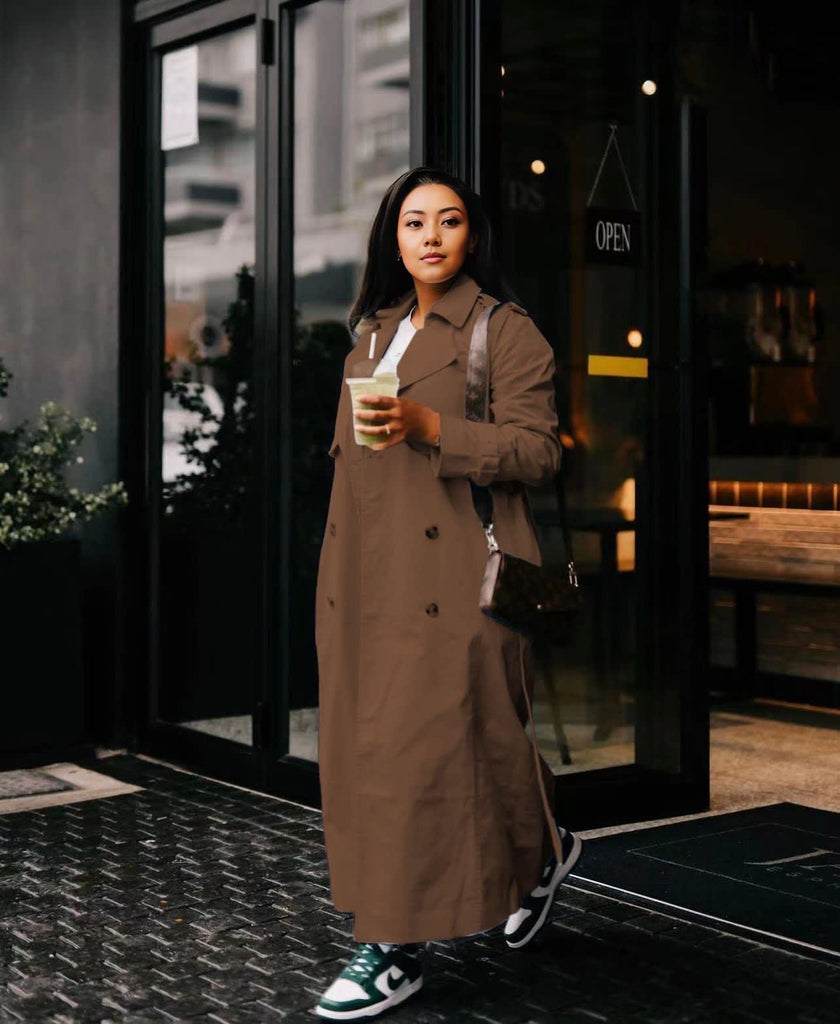 Brown maxi double-breasted coat with notched collar and front button closure