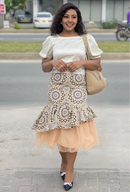 Layered skirt and puff-sleeve blouse set: white blouse, beige printed skirt with tulle hem