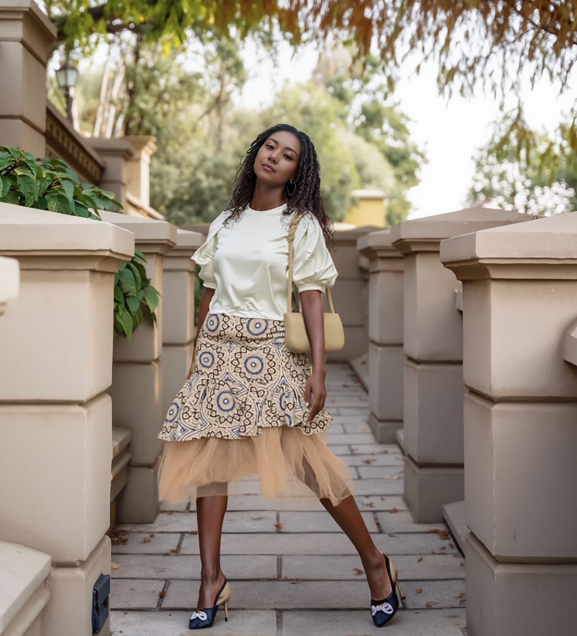 Layered skirt and puff-sleeve blouse set: cream-white blouse, beige printed skirt with tulle hem