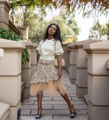 Layered skirt and puff-sleeve blouse set: cream-white blouse, beige printed skirt with tulle hem