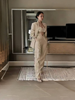 Light beige long blazer with flap pockets and high-waist tie pants