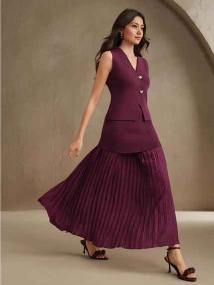 Maroon pleated midi skirt with matching sleeveless vest, gold button detail and V neckline