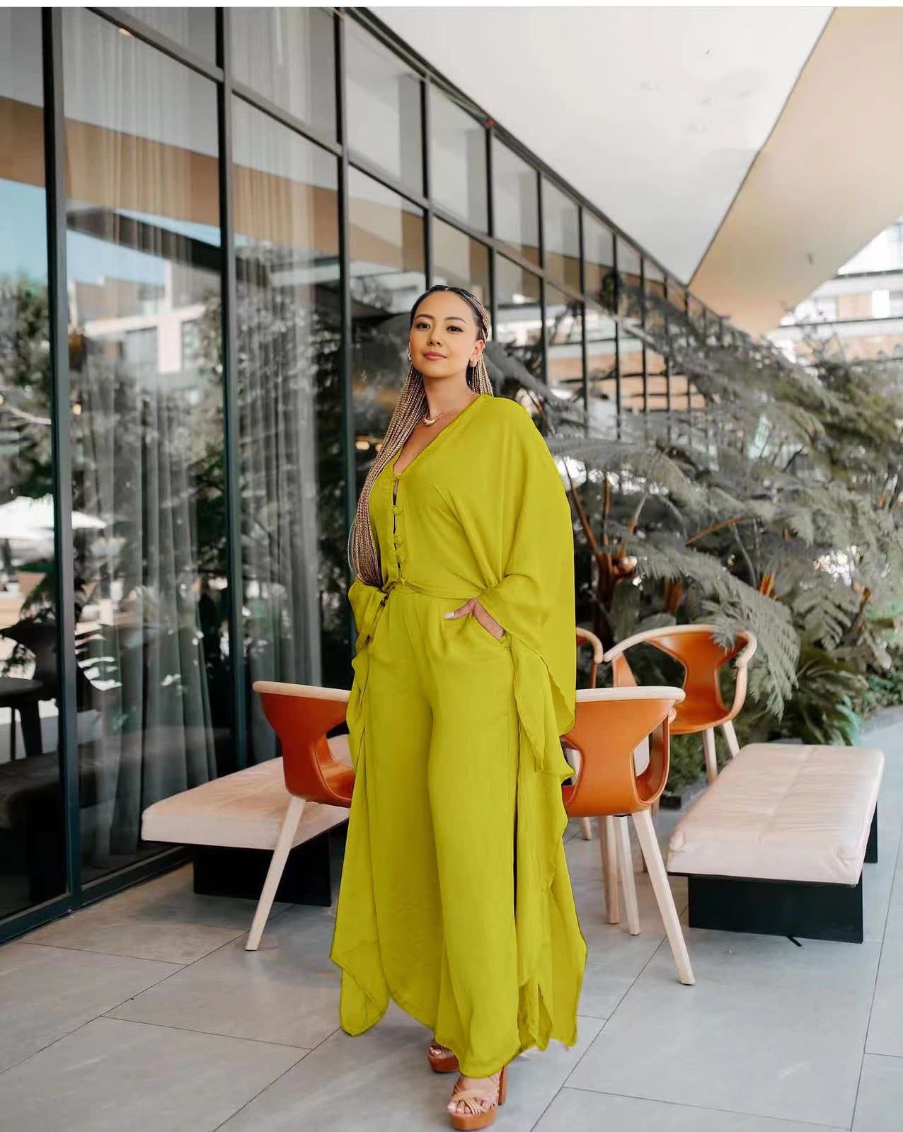 Wide-leg trousers in lime green with relaxed fit and tie waist