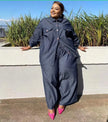 Loose-fit dark navy shirt and pants set with chest pockets and drawstring waist