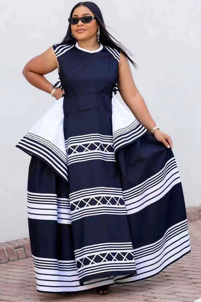 Plus size geometric maxi dress, sleeveless navy with white striped skirt panels