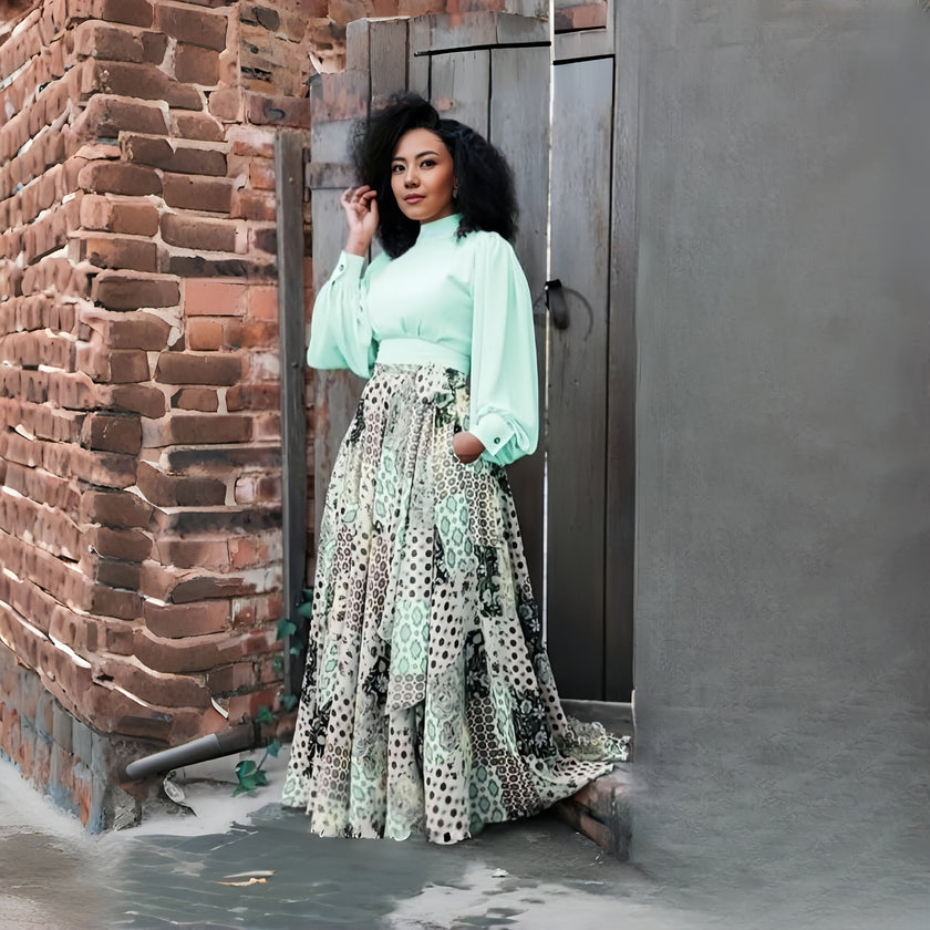 Geometric floral maxi dress with puff sleeves, mint green bodice, long tiered patterned skirt